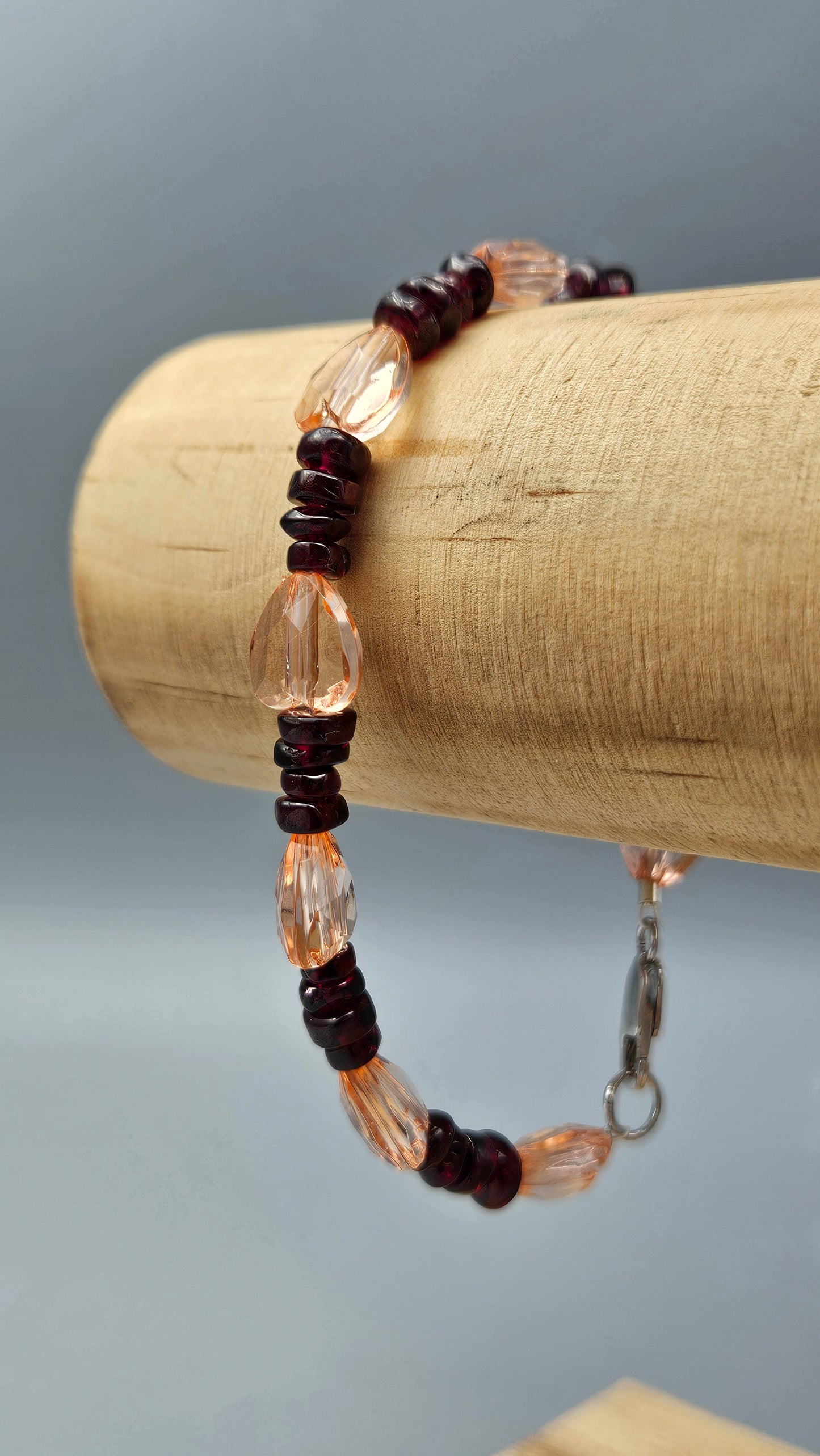 Bracelet cœurs saumon et disques grenat